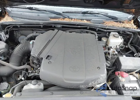 2015 Toyota Tacoma Base V6 z USA, uszkodzony, nr VIN 3TMLU4EN2FM180066